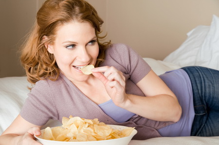 Ожирение и переедание во время менопаузы способствуют росту опухолей